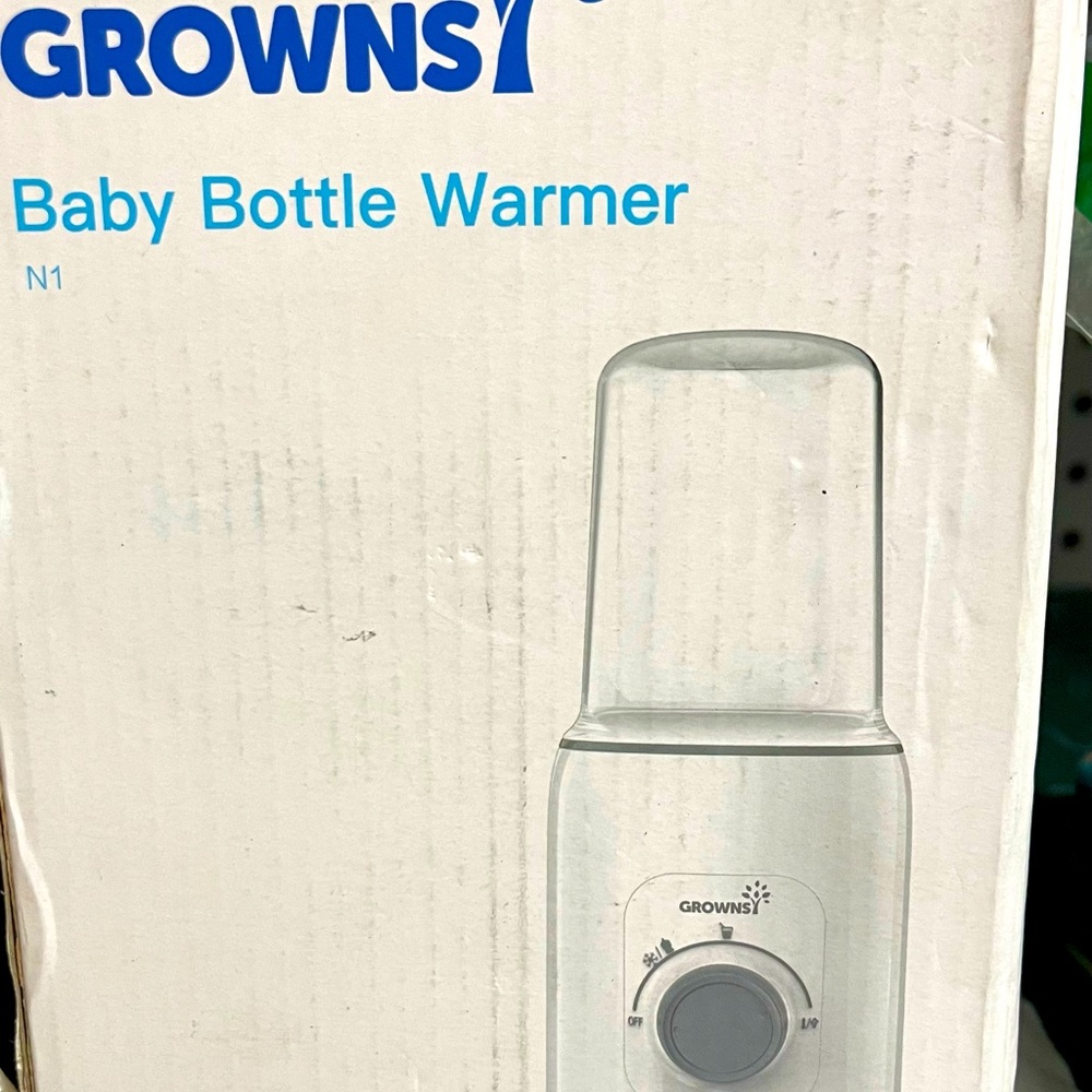 Frowns brand new in box baby bottle warmer